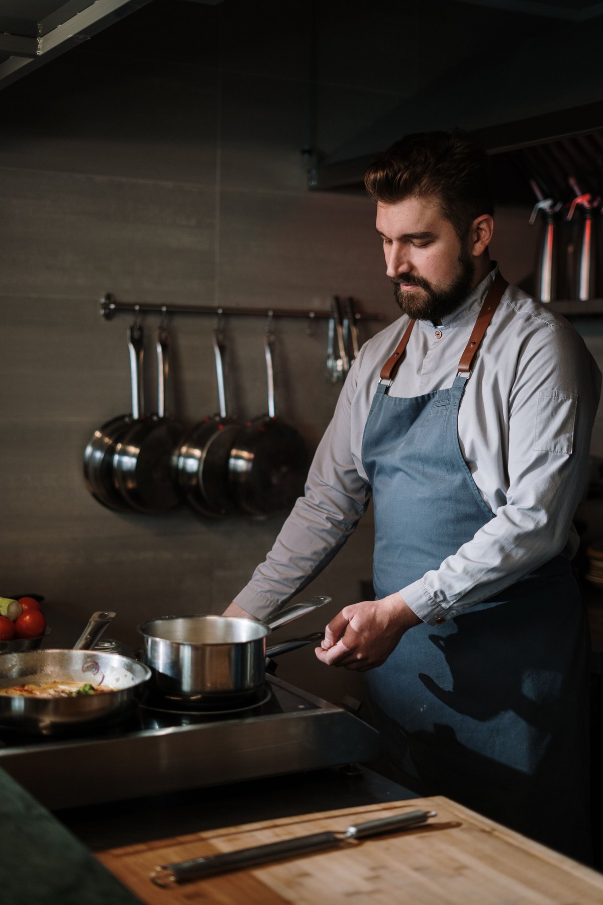 Chef working a compact professional cooking section